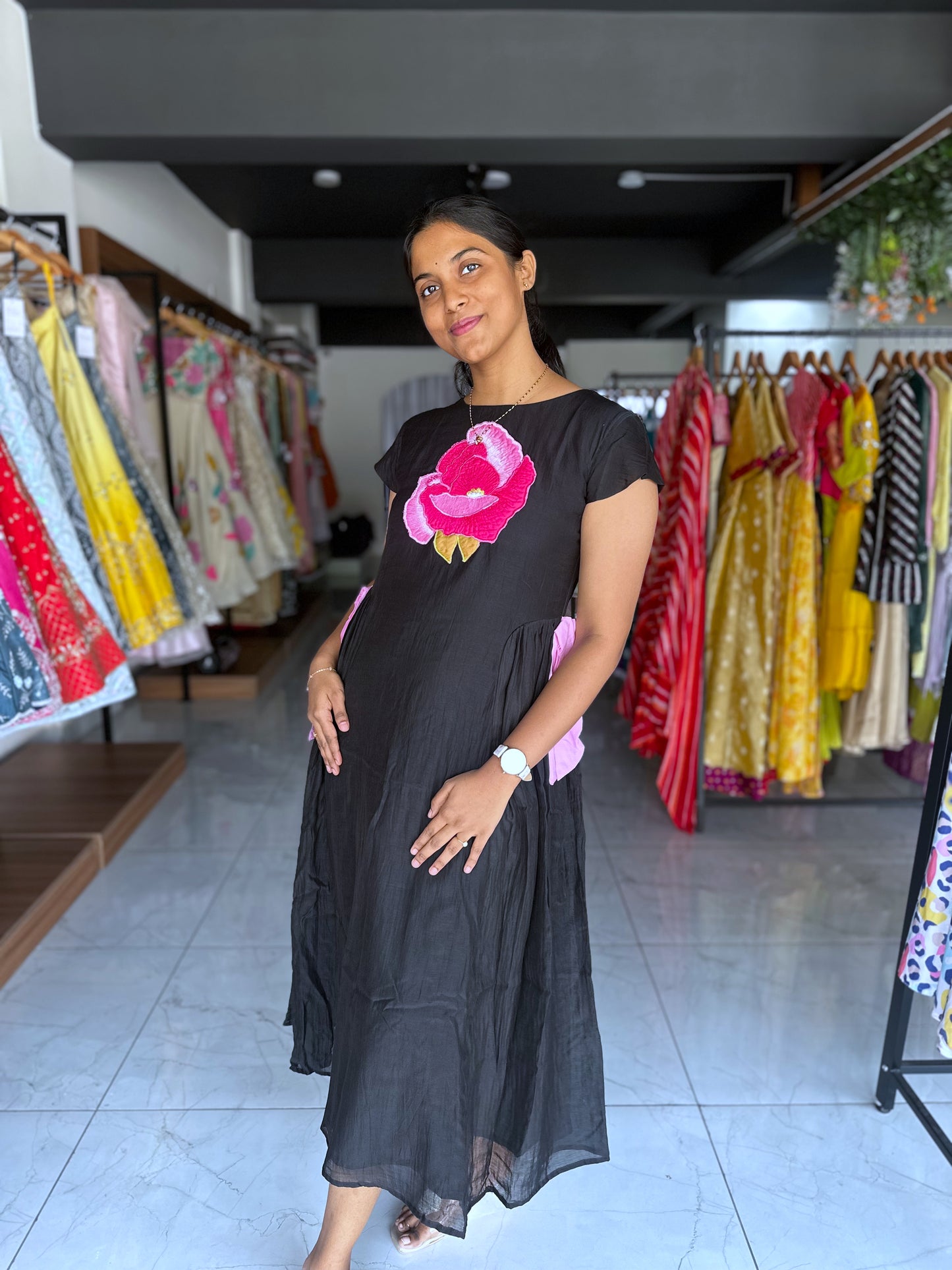 Black frock with pink applique work
