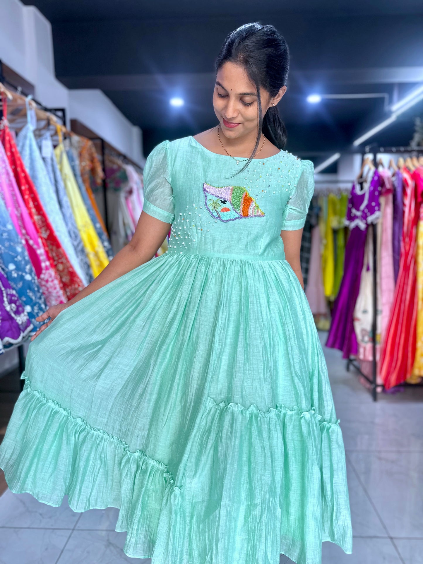 Pastel green frock with hand embroidery motif