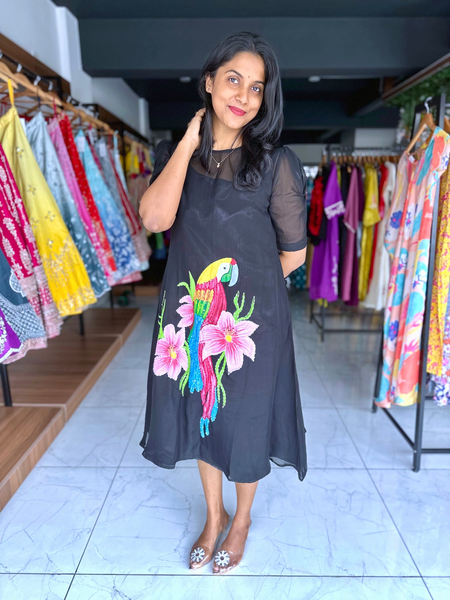 Black organza frock with detachable satin lining and hand painted design