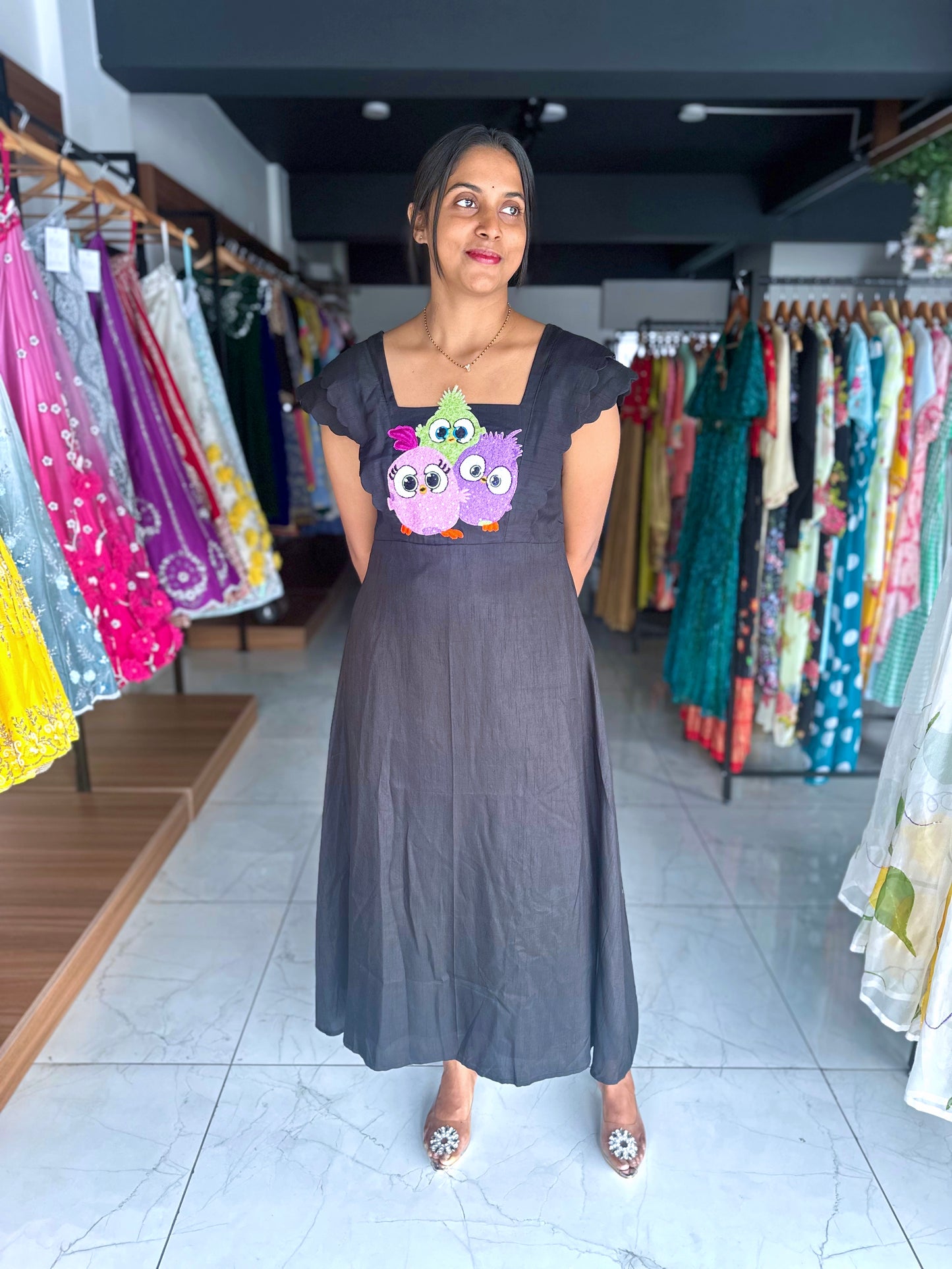 Black raw silk frock with angry birds