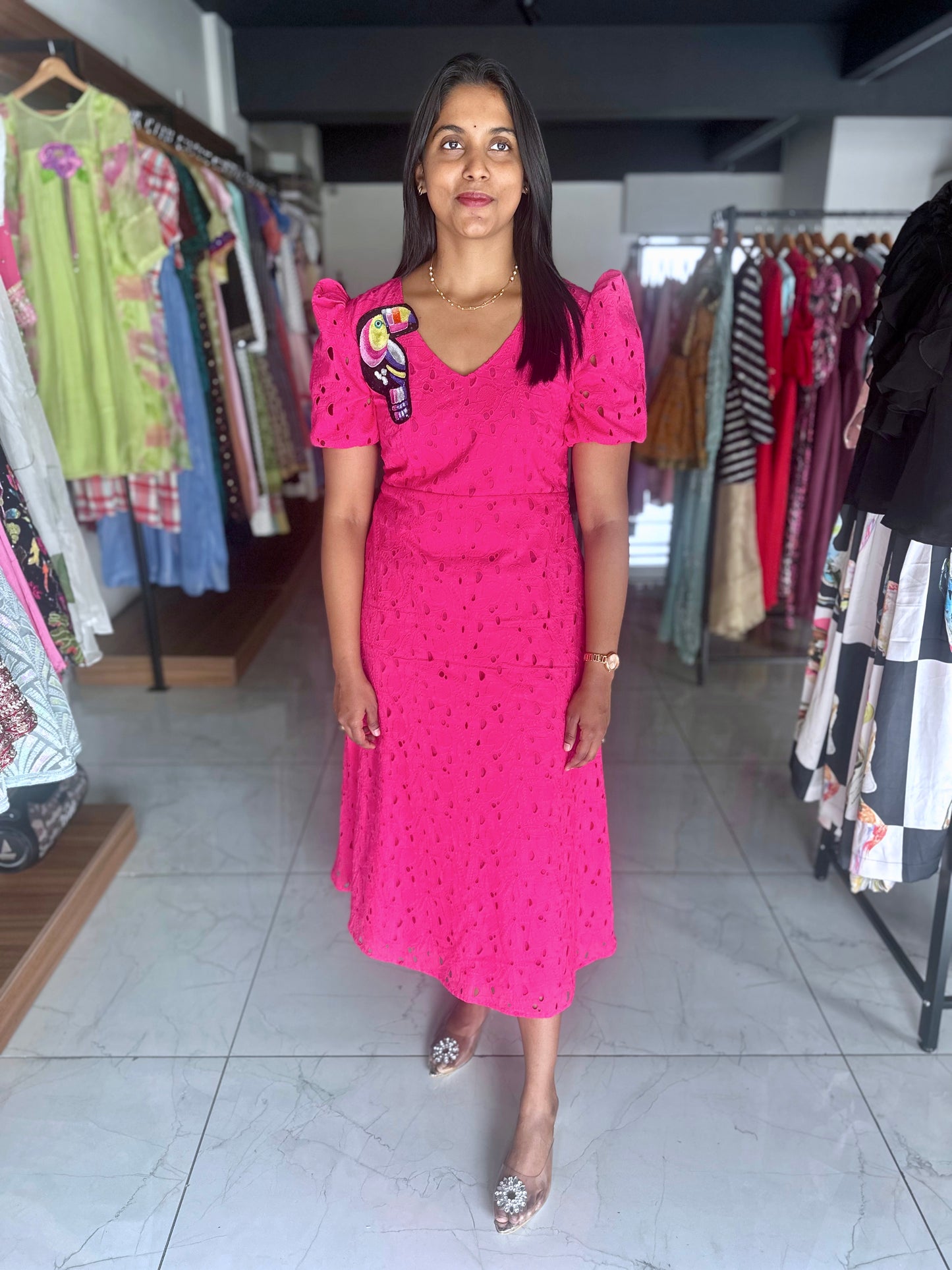 Pink hacoba frock with toucan bird