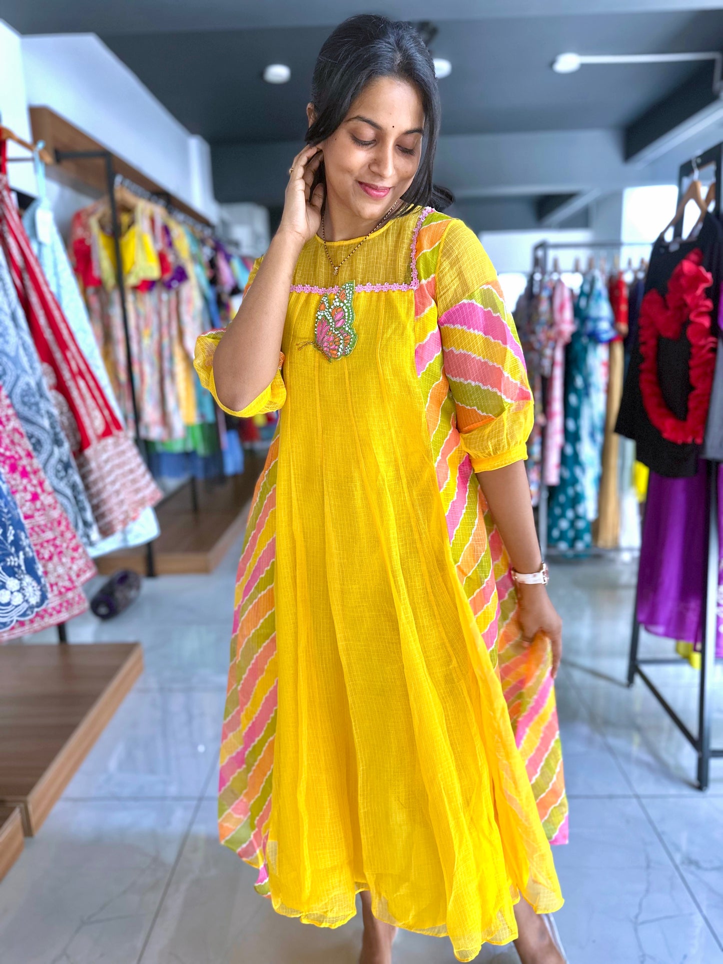 Yellow kota frock with hand embroidery motif