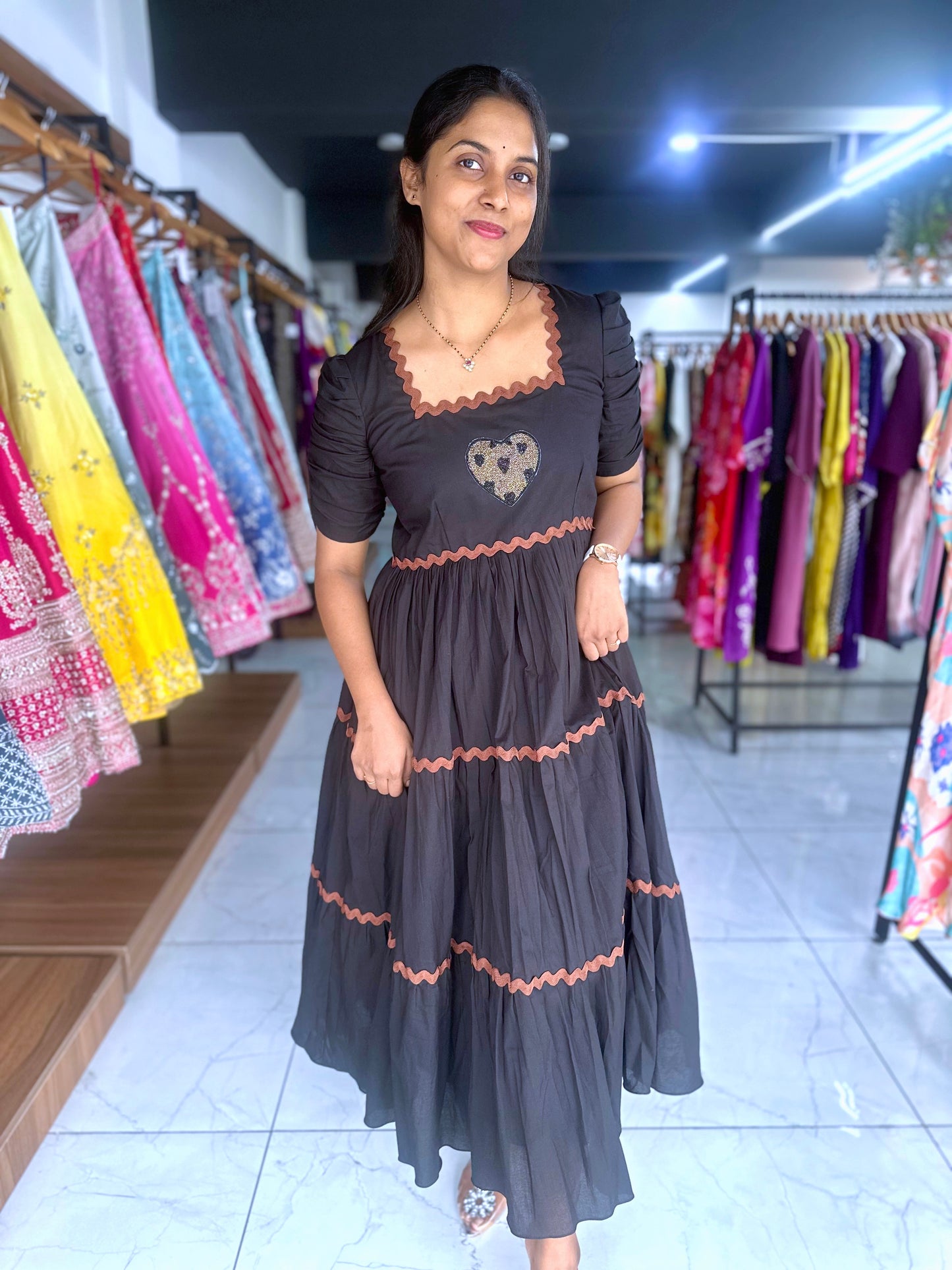 Black frock with hand embroidery motif