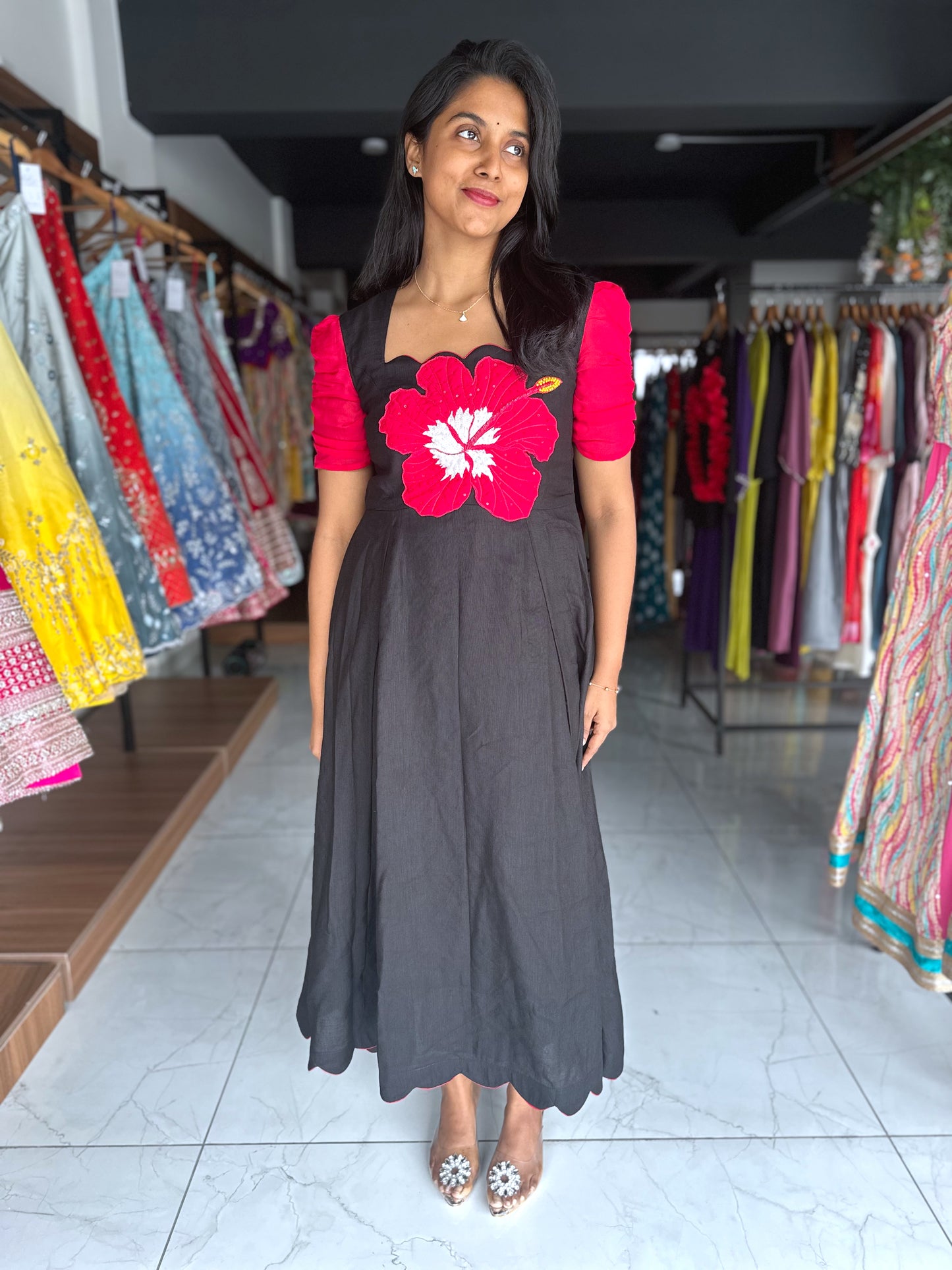 Black frock with bold red hibiscus hand painted motif