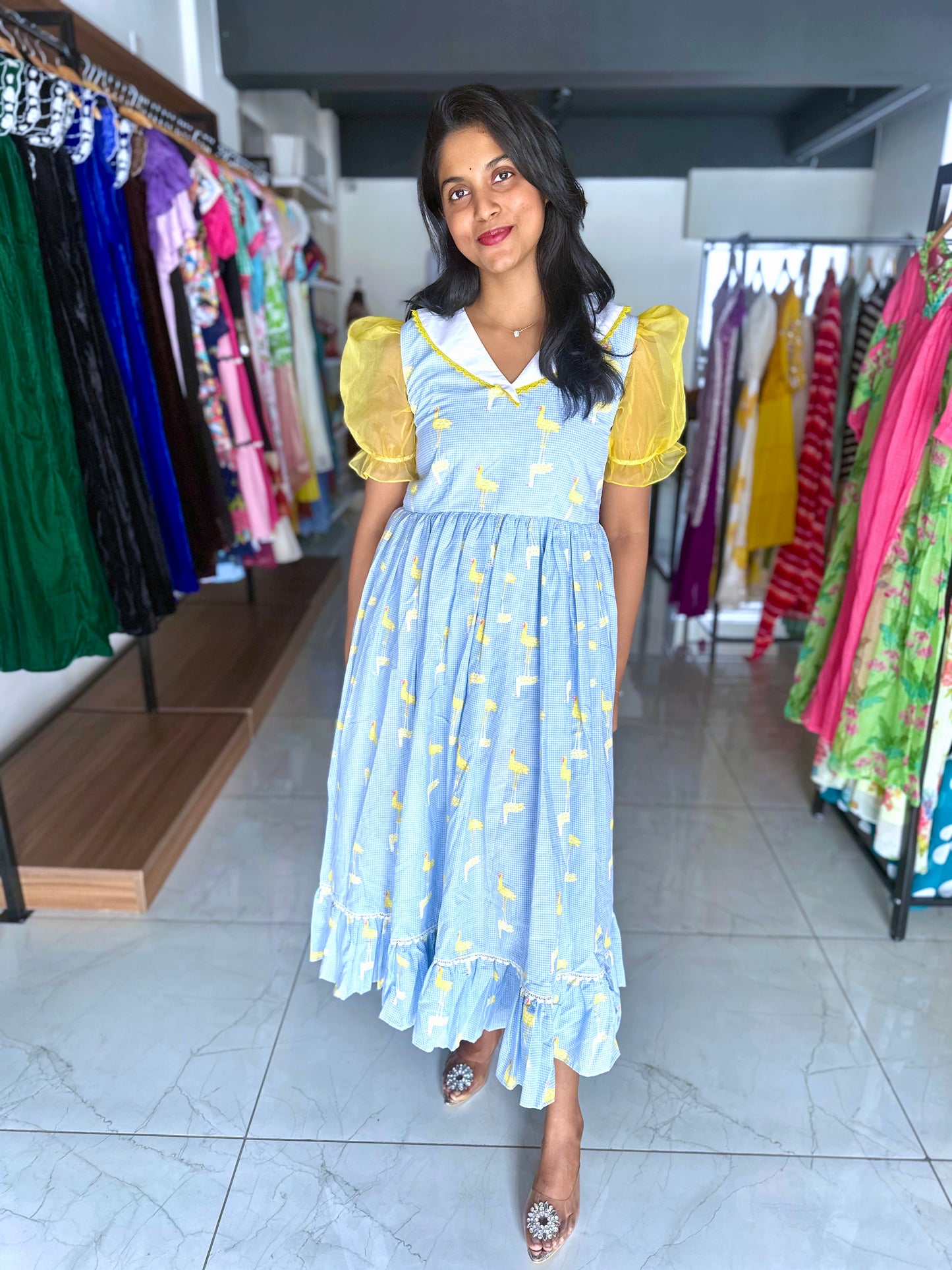 Powder blue cotton frock with swan motif thread work