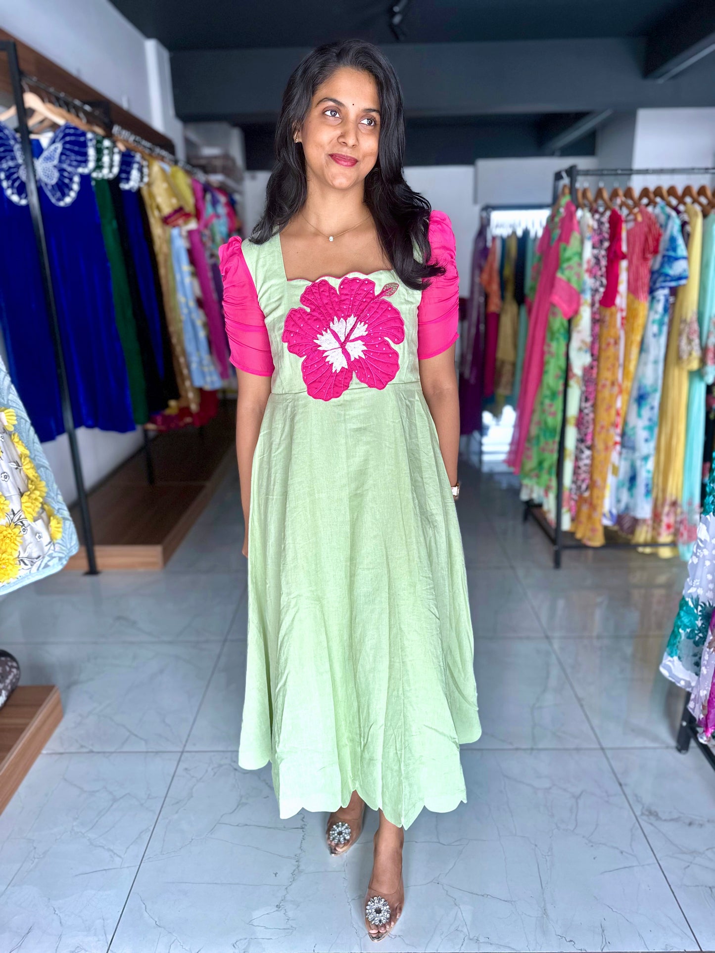 Lenin pista green frock with pink hibiscuss motif