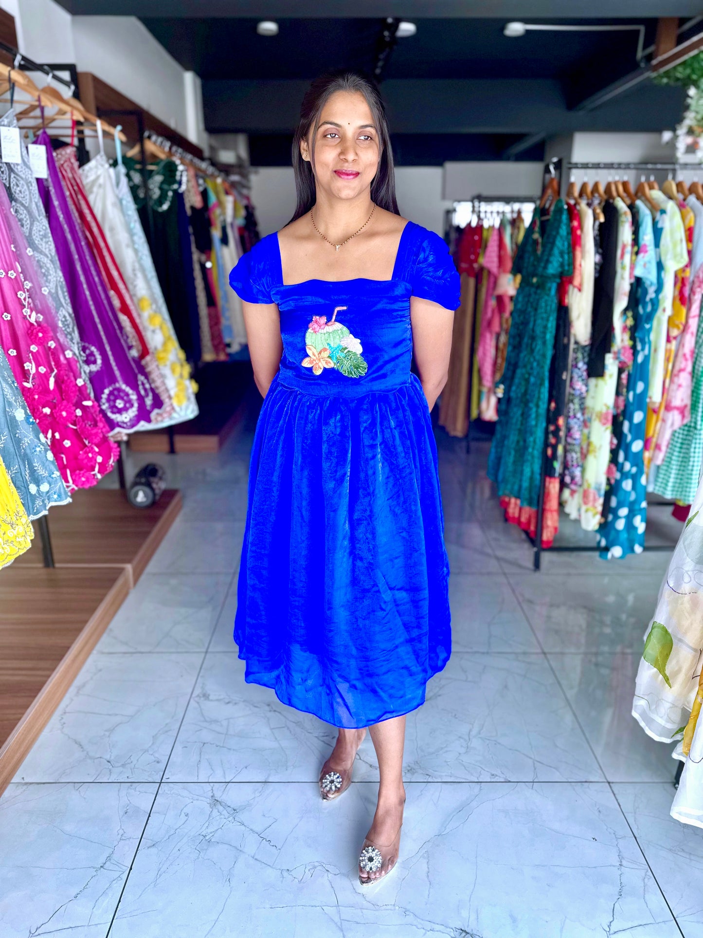 Blue tissue frock with cute hand embroidery motif