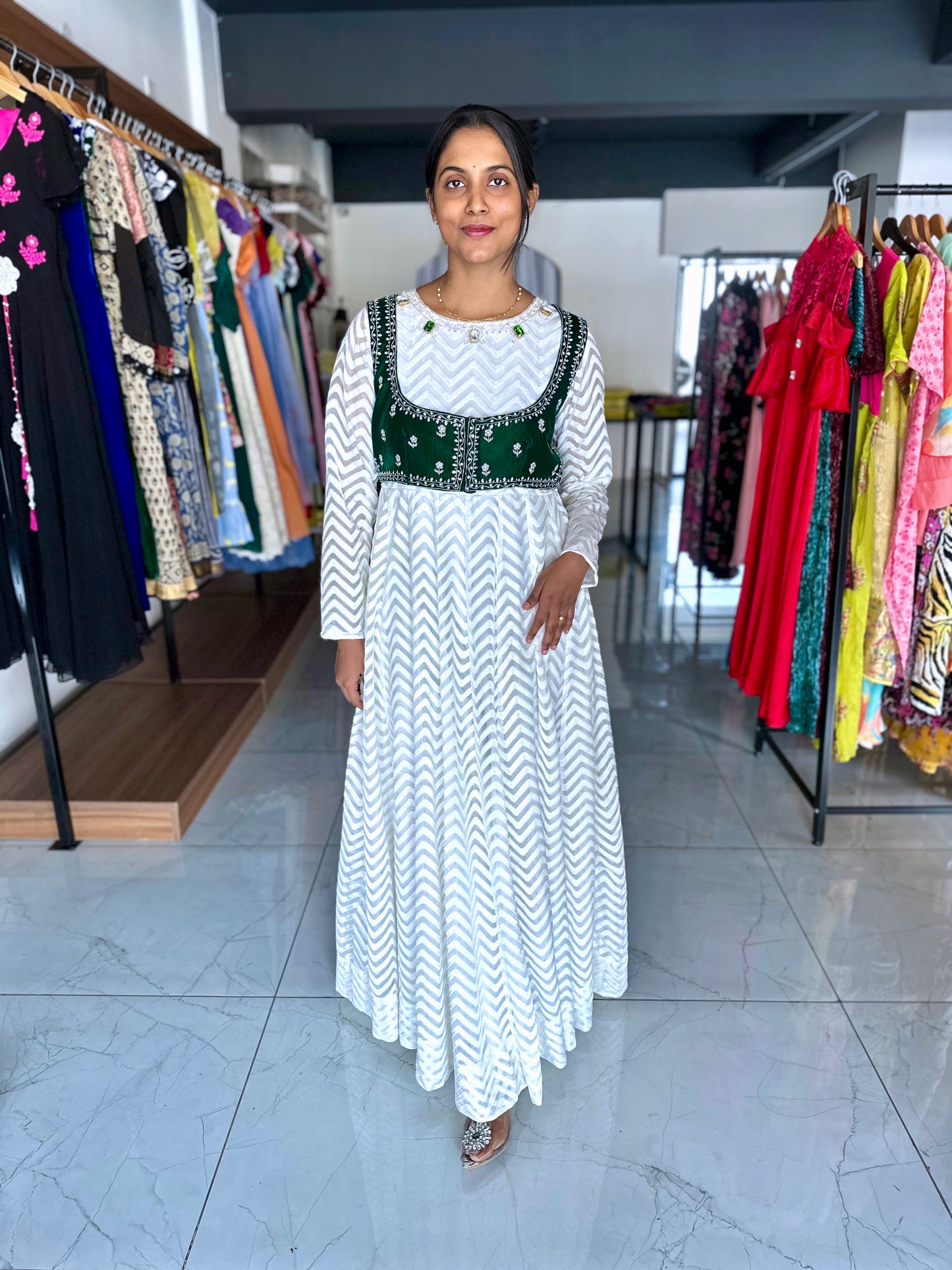 White frock with detachable green velvet jacket with hand embroidery
