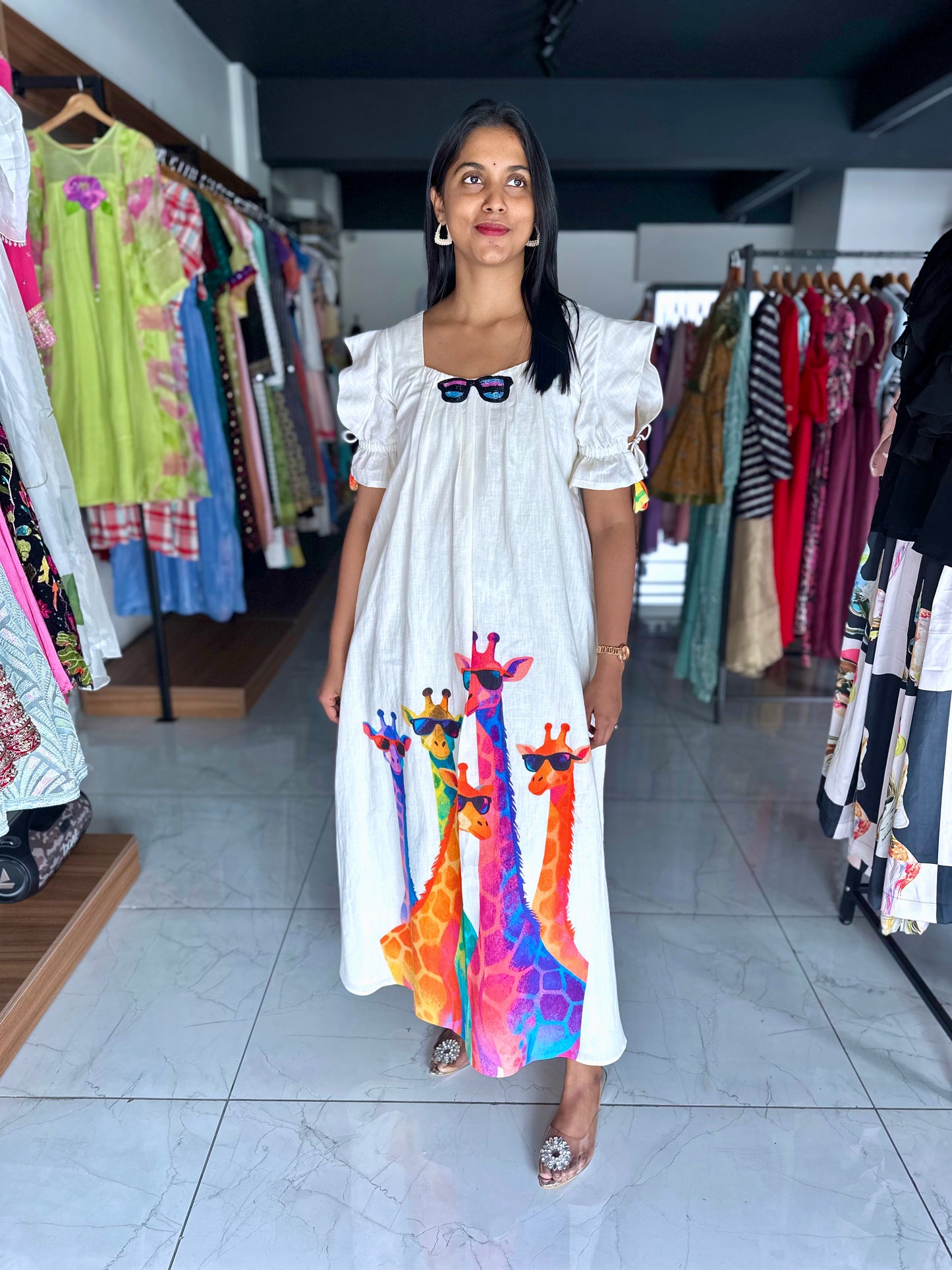 Ivory lenin frock with colourful giraffe motifs