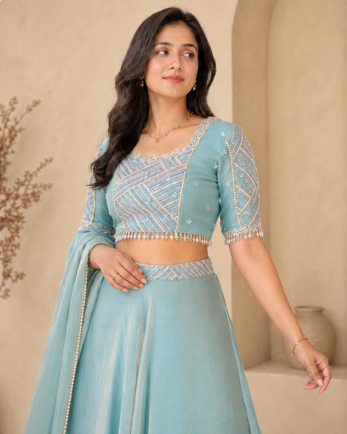 Blue glass tissue lehanga with hand embroidery