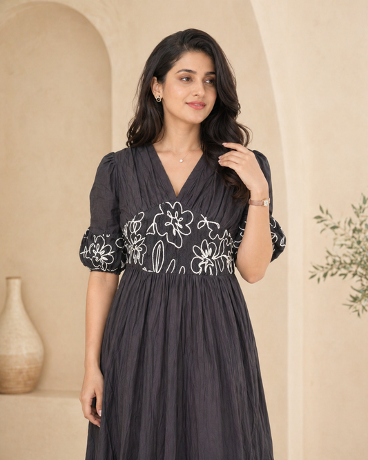 Black cotton frock with sleek thread work detailing