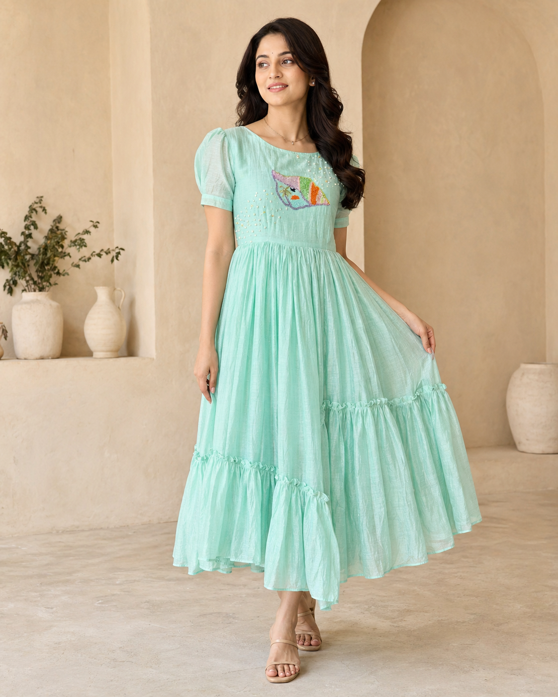 Pastel green frock with hand embroidery motif